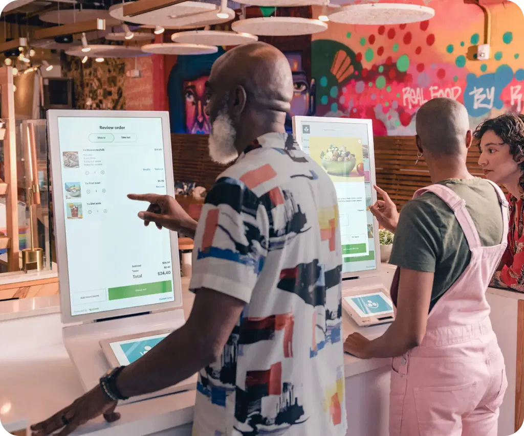 Guests using Clover kiosk